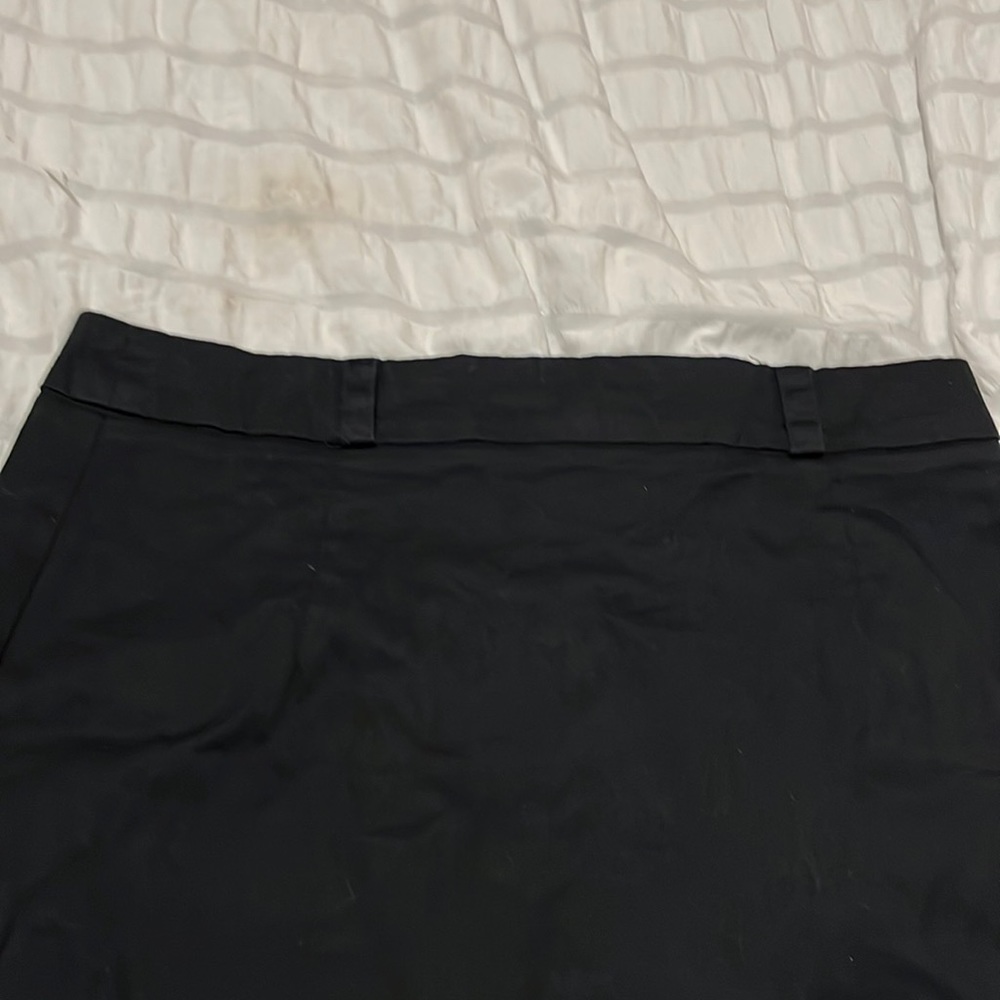 Black knee length skirt. Size is medium